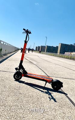 Emove Touring electric scooter with charger, tools and a free lock cable