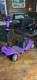 SKRT 4-Wheel Electric Scooter purple withBasket LED 4.5 mph 300 lb